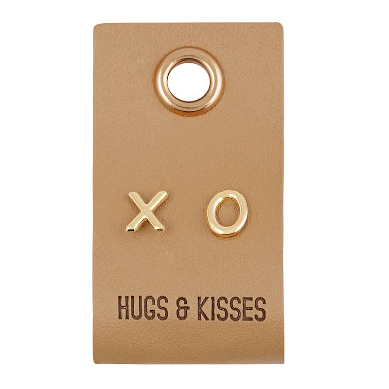 X O Gold Earrings on Leather Tag